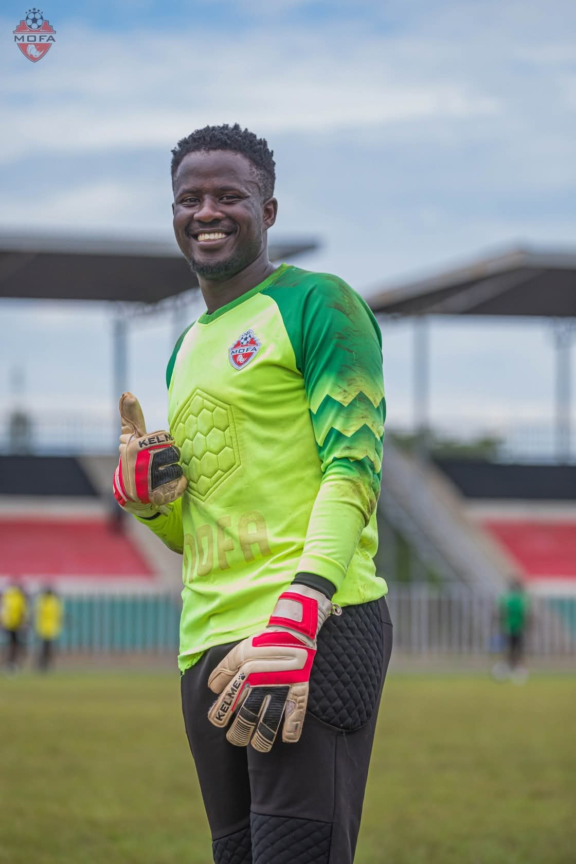 Goalkeeper wearing Adidas Predator Pro gloves